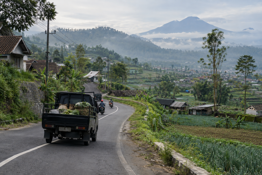 Overland road journey through the green highlands of East Java.